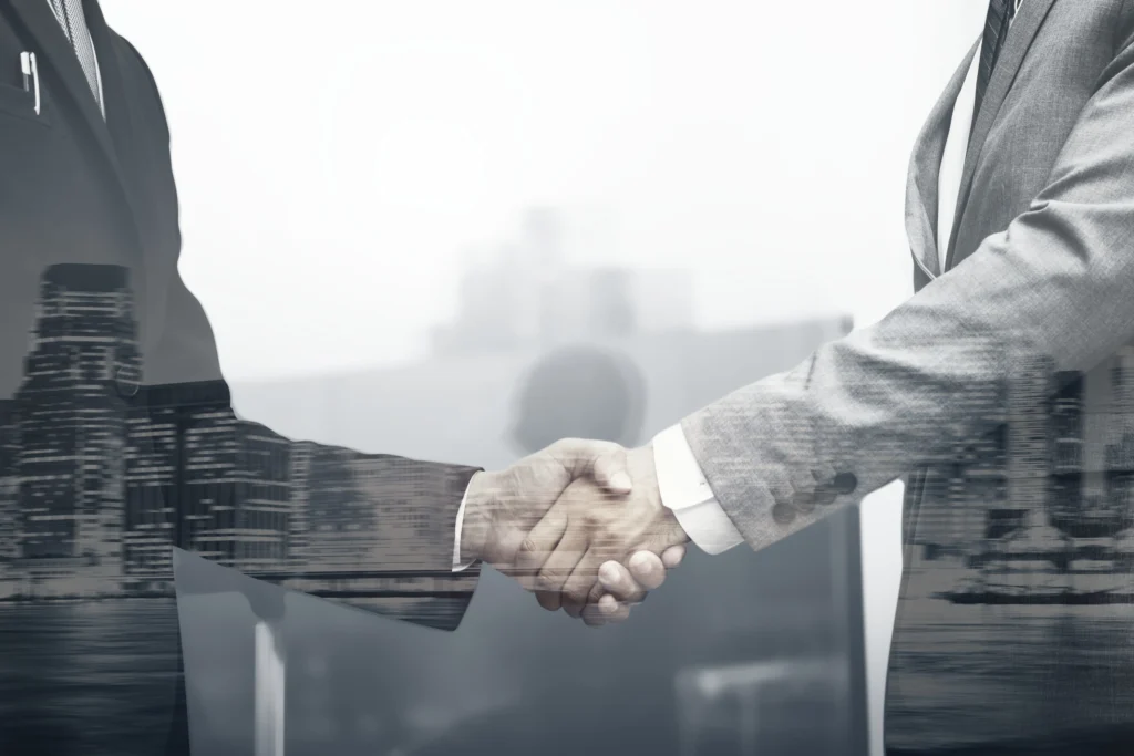 business partners handshake international business concept min AI Solutions for Healthcare